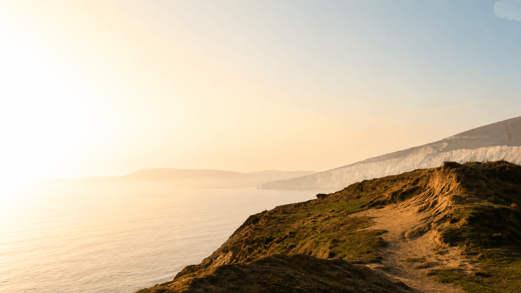 Chalk cliff coast path at sunset, Isle of Wight