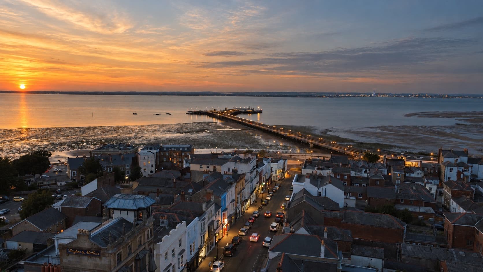 Ryde's high street running down to the pier at sunset